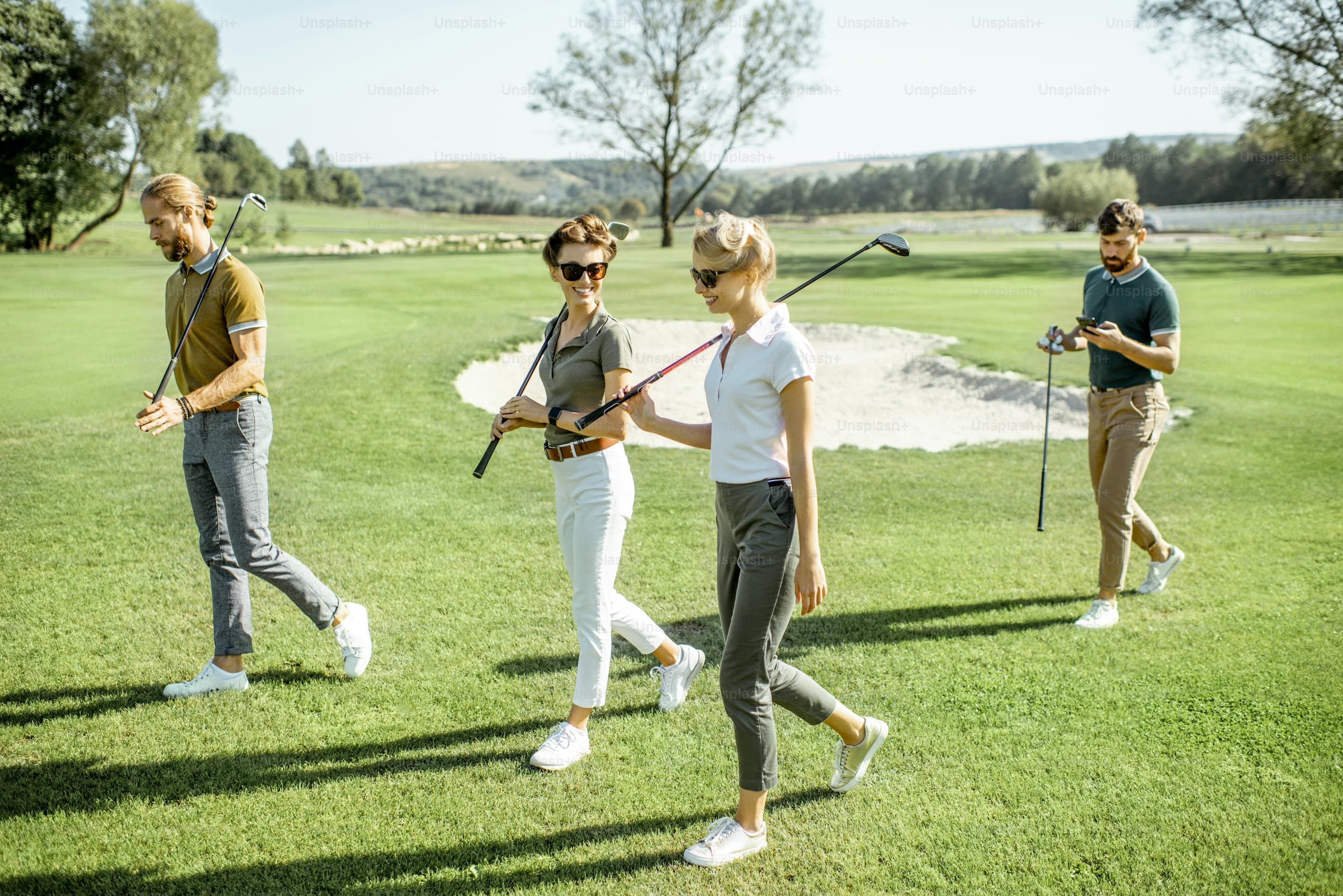 group playing golf